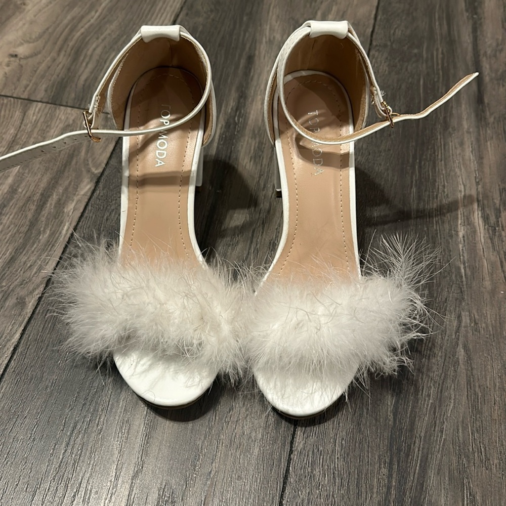 White heels, worn once. Size 7.5